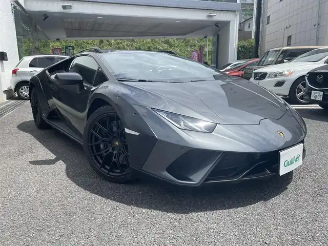 ランボルギーニ ランボルギーニ ウラカン 神奈川県 2023(令5)年 0.1万km グレー グレード：ステラート/カラーコード：LYNX/ワンオーナー/スポーツシート（bi-shell）/ハーフレザーシート（黒）/ブラックカーボンブレーキキャリパー/ルーフレール/クルーズコントロール/純正メモリナビ/バックカメラ/ETC/ミラーモニター型前後ドライブレコーダー/レーダー探知機/プッシュスタート/スペアキー×1本/純正バッテリーメンテナー/保証書あり/取扱説明書あり