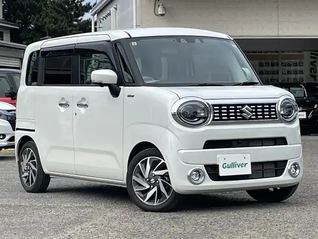スズキ ワゴンＲ スマイル HYBRID X 宮城県 2023(令5)年 1.6万km ピュアホワイトP /4WD//純正9インチメモリナビ//CD/DVD/BT/HDMI/フルセグテレビ//AppleCarPlay/AndroidAuto//両側パワースライドドア//シートヒーターDN席//ヘッドアップディスプレイ//ビルトインETC//op純正15インチアルミホイール//純正フロアマット//デュアルカメラブレーキサポート//アラウンドビューモニター//レーントレーシングアシスト//レーダークルーズコントロール//パーキングセンサー//アイドリングストップ//スマートキーx2//社外14インチアルミスタッドレスタイヤ積込（2022年製）