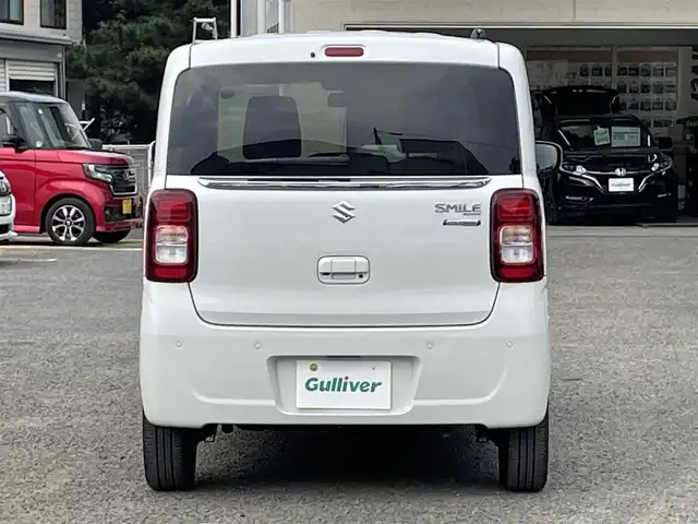 スズキ ワゴンＲ スマイル HYBRID X 宮城県 2023(令5)年 1.6万km ピュアホワイトP /4WD//純正9インチメモリナビ//CD/DVD/BT/HDMI/フルセグテレビ//AppleCarPlay/AndroidAuto//両側パワースライドドア//シートヒーターDN席//ヘッドアップディスプレイ//ビルトインETC//op純正15インチアルミホイール//純正フロアマット//デュアルカメラブレーキサポート//アラウンドビューモニター//レーントレーシングアシスト//レーダークルーズコントロール//パーキングセンサー//アイドリングストップ//スマートキーx2//社外14インチアルミスタッドレスタイヤ積込（2022年製）
