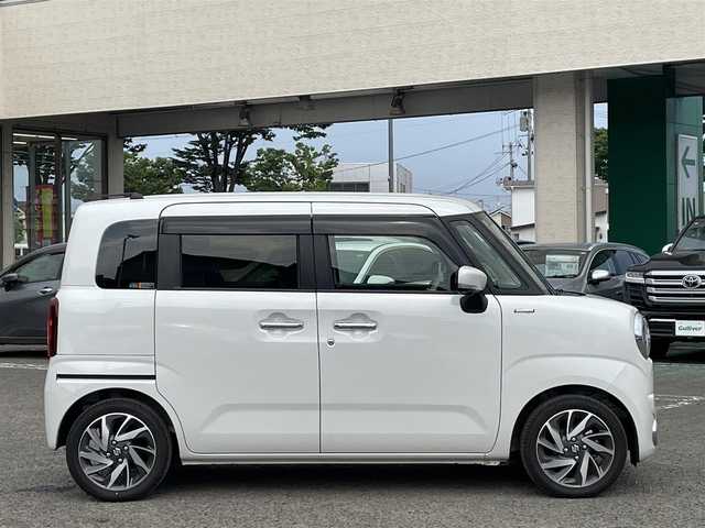 スズキ ワゴンＲ スマイル HYBRID X 宮城県 2023(令5)年 1.6万km ピュアホワイトP /4WD//純正9インチメモリナビ//CD/DVD/BT/HDMI/フルセグテレビ//AppleCarPlay/AndroidAuto//両側パワースライドドア//シートヒーターDN席//ヘッドアップディスプレイ//ビルトインETC//op純正15インチアルミホイール//純正フロアマット//デュアルカメラブレーキサポート//アラウンドビューモニター//レーントレーシングアシスト//レーダークルーズコントロール//パーキングセンサー//アイドリングストップ//スマートキーx2//社外14インチアルミスタッドレスタイヤ積込（2022年製）