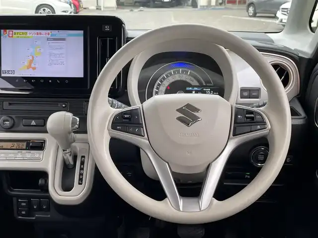 スズキ ワゴンＲ スマイル HYBRID X 宮城県 2023(令5)年 1.6万km ピュアホワイトP /4WD//純正9インチメモリナビ//CD/DVD/BT/HDMI/フルセグテレビ//AppleCarPlay/AndroidAuto//両側パワースライドドア//シートヒーターDN席//ヘッドアップディスプレイ//ビルトインETC//op純正15インチアルミホイール//純正フロアマット//デュアルカメラブレーキサポート//アラウンドビューモニター//レーントレーシングアシスト//レーダークルーズコントロール//パーキングセンサー//アイドリングストップ//スマートキーx2//社外14インチアルミスタッドレスタイヤ積込（2022年製）
