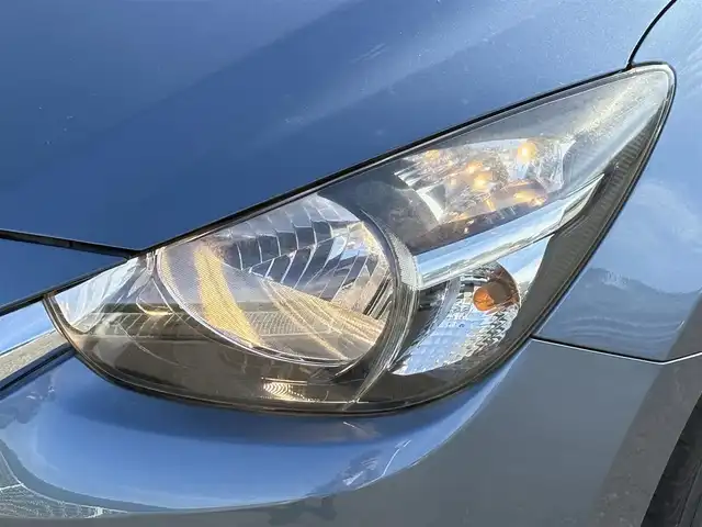 マツダ デミオ XD 岩手県 2015(平27)年 5.3万km ブルーリフレックスマイカ 禁煙車/ディーゼル/純正ナビ/→フルセグTV/Bluetooth/CD/DVD/FM/AM/ステアリングスイッチ/横滑り防止装置/〇プッシュスタート/〇電動格納ミラー/〇スマートキー/〇シガーソケット/トノカバー/USBポート