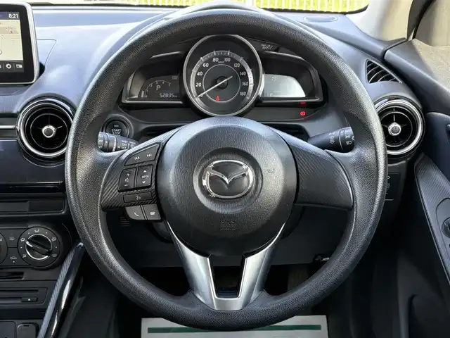 マツダ デミオ XD 岩手県 2015(平27)年 5.3万km ブルーリフレックスマイカ 禁煙車/ディーゼル/純正ナビ/→フルセグTV/Bluetooth/CD/DVD/FM/AM/ステアリングスイッチ/横滑り防止装置/〇プッシュスタート/〇電動格納ミラー/〇スマートキー/〇シガーソケット/トノカバー/USBポート