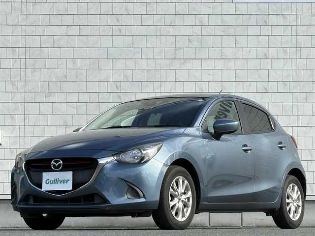 マツダ デミオ XD 千葉県 2015(平27)年 5.3万km ブルーリフレックスマイカ 禁煙車/ディーゼル/純正ナビ/→フルセグTV/Bluetooth/CD/DVD/FM/AM/ステアリングスイッチ/横滑り防止装置/〇プッシュスタート/〇電動格納ミラー/〇スマートキー/〇シガーソケット/トノカバー/USBポート