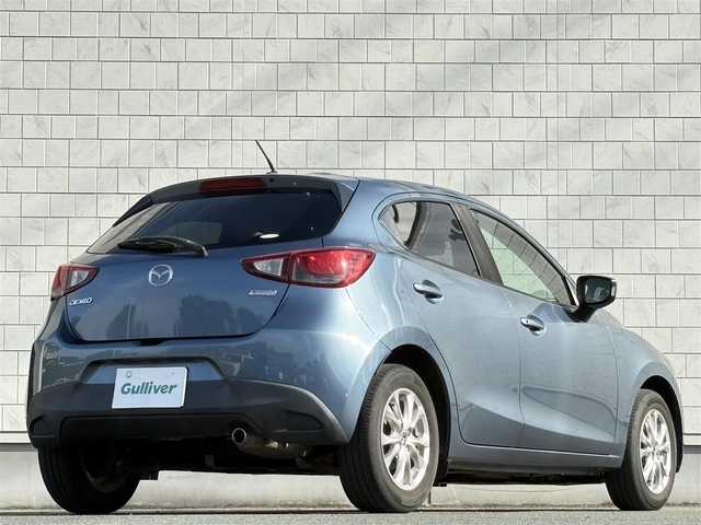 マツダ デミオ XD 千葉県 2015(平27)年 5.3万km ブルーリフレックスマイカ 禁煙車/ディーゼル/純正ナビ/→フルセグTV/Bluetooth/CD/DVD/FM/AM/ステアリングスイッチ/横滑り防止装置/〇プッシュスタート/〇電動格納ミラー/〇スマートキー/〇シガーソケット/トノカバー/USBポート