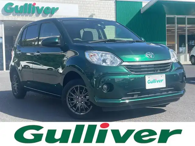 トヨタ パッソ X Lパッケージ 島根県 2023(令5)年 1.6万km ダークエメラルドマイカ ワンオーナ　/社外ナビ/DVD再生/Blutooth/前後ドライブレコーダー　/ビルトインＥＴＣ　/衝突軽減ブレーキ/アイドリングストップ　/スマートキー　/プッシュスタート　/オートハイビーム/純正ＬＥＤヘッドライト　/保証書・取扱説明書/スペアキー