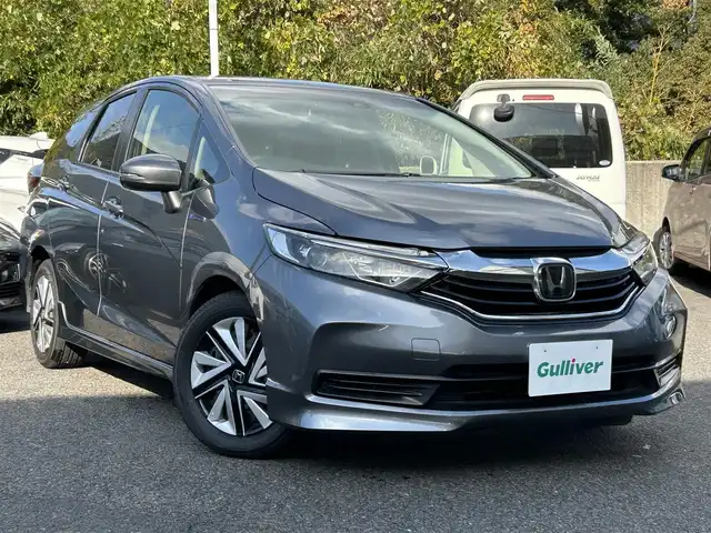 ホンダ シャトル ハイブリッド ホンダセンシング 長崎県 2020(令2)年 1.9万km シャイニンググレーM HONDAインターナビ(FM/AM/CD/USB/BTオーディオ)/バックカメラ/プッシュスタート/スマートキー/ステアリングスイッチ/レーダークルーズコントロール/ビルトインETC/ナビ連動型ドラレコ/純正フロアマット/ABS/VSA/LKAS/路外逸脱抑制システム/CMBS/ヘッドライトレベリングダイヤル/SRSエアバッグ/ISOFIX/取説/保証書