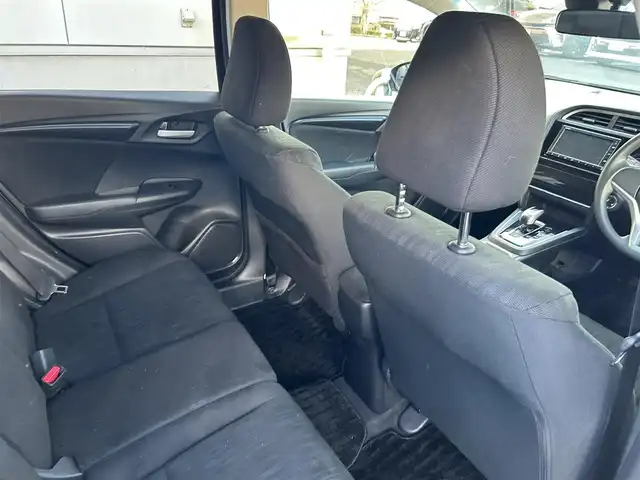 ホンダ シャトル ハイブリッド ホンダセンシング 長崎県 2020(令2)年 1.9万km シャイニンググレーM HONDAインターナビ(FM/AM/CD/USB/BTオーディオ)/バックカメラ/プッシュスタート/スマートキー/ステアリングスイッチ/レーダークルーズコントロール/ビルトインETC/ナビ連動型ドラレコ/純正フロアマット/ABS/VSA/LKAS/路外逸脱抑制システム/CMBS/ヘッドライトレベリングダイヤル/SRSエアバッグ/ISOFIX/取説/保証書