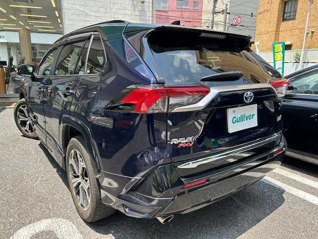 トヨタ ＲＡＶ４ ＰＨＶ ブラックトーン 東京都 2021(令3)年 4.1万km アティチュードブラックマイカ/ダークブルーマイカ 2トーン 登録時走行40864km/ワンオーナー/セーフティセンス/・プリクラッシュセーフティ/・レーントレーシングアシスト/・レーダークルーズコントロール/・オートマチックハイビーム/・ロードサインアシスト/モデリスタエアロ/パノラマムーンルーフ/純正メモリーナビ・フルセグTV/パノラミックビューモニター/デジタルインナーミラー/黒革シート（合皮）/前席パワーシート/前席シートベンチレーション＆シートヒーター/ハンズフリーパワーバックドア/インテリジェントクリアランスソナー/おくだけ充電/ビルトインETC2.0/前後ドライブレコーダー/アクセサリーコンセント/LEDライト/R4.5.6.7年記録簿/保証書・取説/スペアキー