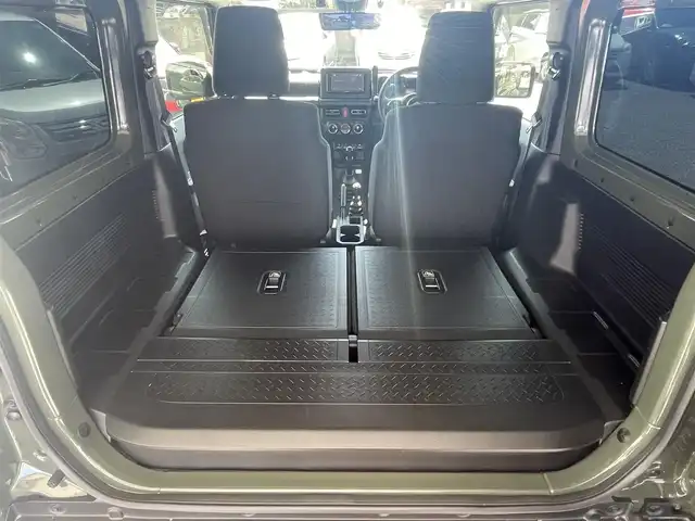 スズキ ジムニー シエラ JC 茨城県 2022(令4)年 2.9万km ジャングルグリーン ナビ（AM.FM.DVD.USB.BT）/車線逸脱警報/デュアルセンサーブレーキ/ヒルディセントコントロールスイッチ/トランスファーレバー/シートヒーター/電動格納式ミラー/スタッドレス付き/バックカメラ/社外マフラー/社外ホイール