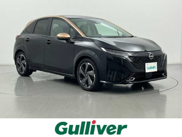 日産 オーラ G レザーエディション 熊本県 2022(令4)年 2.6万km ミッドナイトブラック/サンライズカッパー 純正ナビ/（フルセグTV/Bluetooth/USB/AppleCarPlay/HDMI）/BOSEサウンド/プロパイロット/全方位カメラ/ビルトインETC2.0/前席シートヒーター/ステアリングヒーター/純正前方ドライブレコーダー/前後クリアランスソナー/置くだけ充電/デジタルインナーミラー/衝突軽減ブレーキ/レーンキープアシスト/横滑り防止/ブラインドスポットモニター/純正フロアマット/純正17インチAW/オートライト/オートマチックハイビーム/LEDヘッドライト/フォグランプ/保証書