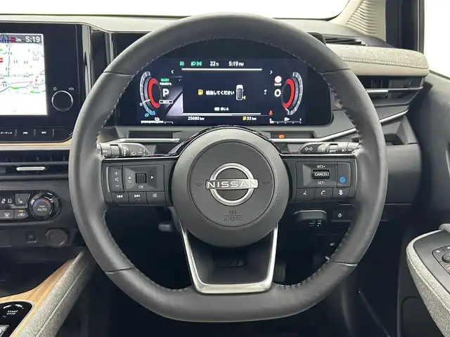 日産 オーラ G レザーエディション 熊本県 2022(令4)年 2.6万km ミッドナイトブラック/サンライズカッパー 純正ナビ/（フルセグTV/Bluetooth/USB/AppleCarPlay/HDMI）/BOSEサウンド/プロパイロット/全方位カメラ/ビルトインETC2.0/前席シートヒーター/ステアリングヒーター/純正前方ドライブレコーダー/前後クリアランスソナー/置くだけ充電/デジタルインナーミラー/衝突軽減ブレーキ/レーンキープアシスト/横滑り防止/ブラインドスポットモニター/純正フロアマット/純正17インチAW/オートライト/オートマチックハイビーム/LEDヘッドライト/フォグランプ/保証書