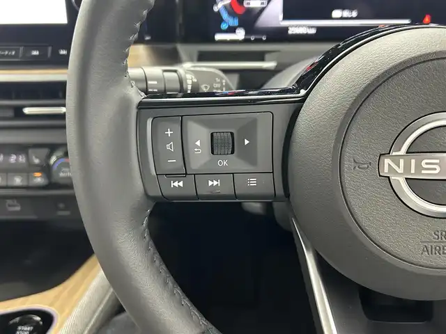 日産 オーラ G レザーエディション 熊本県 2022(令4)年 2.6万km ミッドナイトブラック/サンライズカッパー 純正ナビ/（フルセグTV/Bluetooth/USB/AppleCarPlay/HDMI）/BOSEサウンド/プロパイロット/全方位カメラ/ビルトインETC2.0/前席シートヒーター/ステアリングヒーター/純正前方ドライブレコーダー/前後クリアランスソナー/置くだけ充電/デジタルインナーミラー/衝突軽減ブレーキ/レーンキープアシスト/横滑り防止/ブラインドスポットモニター/純正フロアマット/純正17インチAW/オートライト/オートマチックハイビーム/LEDヘッドライト/フォグランプ/保証書