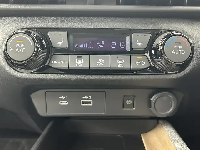 日産 オーラ G レザーエディション 熊本県 2022(令4)年 2.6万km ミッドナイトブラック/サンライズカッパー 純正ナビ/（フルセグTV/Bluetooth/USB/AppleCarPlay/HDMI）/BOSEサウンド/プロパイロット/全方位カメラ/ビルトインETC2.0/前席シートヒーター/ステアリングヒーター/純正前方ドライブレコーダー/前後クリアランスソナー/置くだけ充電/デジタルインナーミラー/衝突軽減ブレーキ/レーンキープアシスト/横滑り防止/ブラインドスポットモニター/純正フロアマット/純正17インチAW/オートライト/オートマチックハイビーム/LEDヘッドライト/フォグランプ/保証書