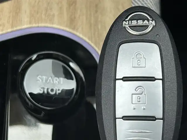 日産 オーラ G レザーエディション 熊本県 2022(令4)年 2.6万km ミッドナイトブラック/サンライズカッパー 純正ナビ/（フルセグTV/Bluetooth/USB/AppleCarPlay/HDMI）/BOSEサウンド/プロパイロット/全方位カメラ/ビルトインETC2.0/前席シートヒーター/ステアリングヒーター/純正前方ドライブレコーダー/前後クリアランスソナー/置くだけ充電/デジタルインナーミラー/衝突軽減ブレーキ/レーンキープアシスト/横滑り防止/ブラインドスポットモニター/純正フロアマット/純正17インチAW/オートライト/オートマチックハイビーム/LEDヘッドライト/フォグランプ/保証書