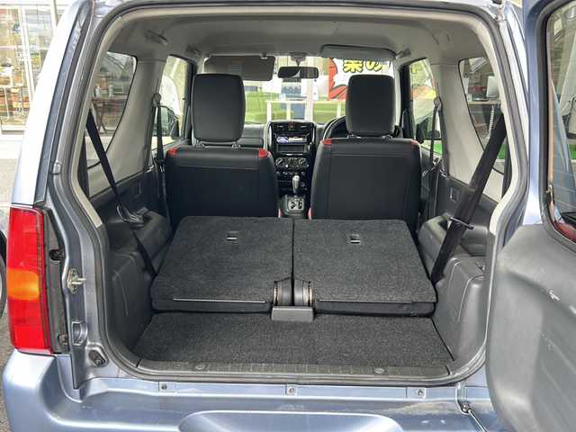 スズキ ジムニー クロスアドベンチャー 鳥取県 2013(平25)年 3.6万km ブリーズブルーメタリック 純正キーレス/パートタイム４WD/専用合革シート（ヒーター）/背面ハードカバー/メッキグリル/メッキアンダーカバー/フォグライト/革巻ハンドル/社外１６インチAW/純正ラジアル4本積込/プライバシーガラス/社外CD/保証書・取説