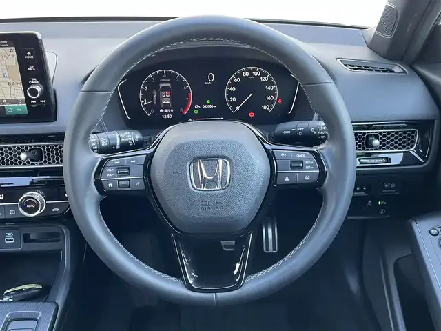 ホンダ シビック LX 群馬県 2023(令5)年 4.2万km プラチナホワイトパール 純正メモリーナビ　/フルセグ　/バックカメラ　/前後ドラレコ　/ウィングエアロ　/シュナイダーホイール　/純正ビルトインＥＴＣ２．０　/ＢＳＭ　/アダプティブクルーズコントロール　/ＬＥＤヘッドライト　/純正フロアマット/Bluethooth/前席シートヒーター/LEDヘッドライト/アイドリングストップ/パワーステアリング