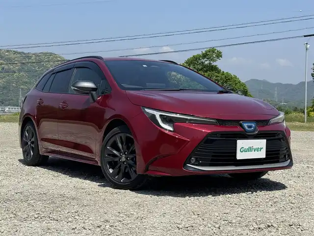 トヨタ カローラツーリング ハイブリッド ダブルバイビー 兵庫県 2022(令4)年 2.3万km センシュアルレッドマイカ 純正10.5インチナビ/フルセグTV/Bluetooth接続可/バックカメラ/ビルトインETC2.0/レーダークルコン/ステアリングリモコン/純正17インチAW/LEDヘッドライト/AUTOハイビーム/ブラインドスポットモニター