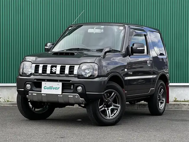 スズキ ジムニー クロスアドベンチャー 宮城県 2014(平26)年 2.4万km クエーサーグレーメタリック 5速MT/社外SDナビ/・CD/DVD/・Bluetooth/・フルセグTV/バックカメラ/ETC/ドライブレコーダー/専用合皮シート/シートヒーター/革巻きステアリング/フォグランプ/電動格納ミラー/純正16インチAW（サマー）/背面タイヤ/純正フロアマット/Wエアバッグ