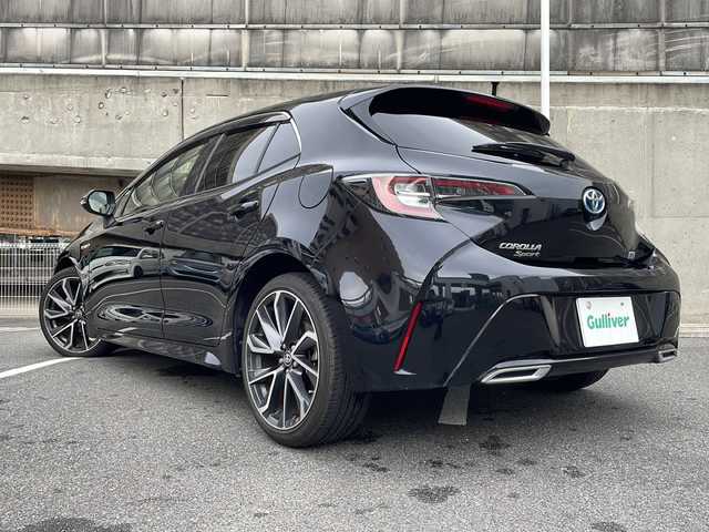 トヨタ カローラ スポーツ ハイブリッドG Z 愛知県 2018(平30)年 6.6万km アティチュードブラックマイカ ワンオーナー/純正ナビ/フルセグTV・Bluetooth・CD・DVD・SD・AM・FM/バックカメラ/Toyota Safety Sense/・レーダークルーズコントロール/・プリクラッシュセーフティー/・クリアランスソナー/・ブラインドスポットモニター/・レーントレーシングアシスト/・ロードサインアシスト/・先行車発進告知機能/・リヤクロストラフィックアラート/・パーキングサポートブレーキ/AC100V電源/オートブレーキホールド/オートハイビーム/LEDヘッドライト/フォグランプ/ヘッドライトレベライザー/ビルドインETC/純正18インチAW/ステアリングスイッチ/純正フロアマット/純正ドアバイザー/ISOFIX/ディーラー整備記録簿（H30.R1.R2.R3.R4.R5）/保証書/取扱説明書