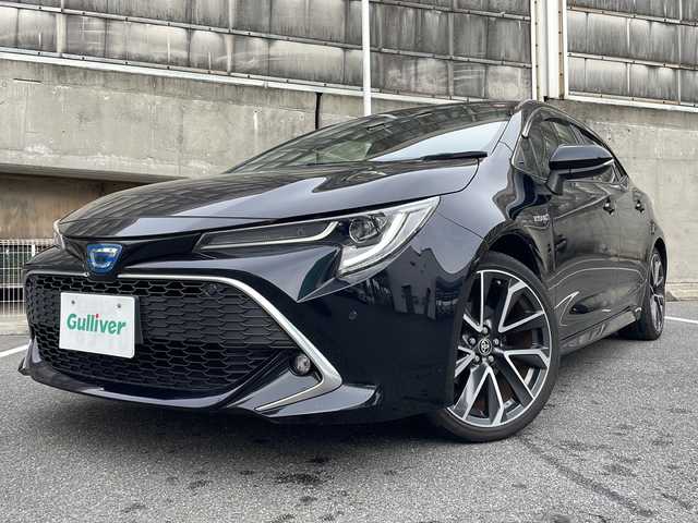 トヨタ カローラ スポーツ ハイブリッドG Z 愛知県 2018(平30)年 6.6万km アティチュードブラックマイカ ワンオーナー/純正ナビ/フルセグTV・Bluetooth・CD・DVD・SD・AM・FM/バックカメラ/Toyota Safety Sense/・レーダークルーズコントロール/・プリクラッシュセーフティー/・クリアランスソナー/・ブラインドスポットモニター/・レーントレーシングアシスト/・ロードサインアシスト/・先行車発進告知機能/・リヤクロストラフィックアラート/・パーキングサポートブレーキ/AC100V電源/オートブレーキホールド/オートハイビーム/LEDヘッドライト/フォグランプ/ヘッドライトレベライザー/ビルドインETC/純正18インチAW/ステアリングスイッチ/純正フロアマット/純正ドアバイザー/ISOFIX/ディーラー整備記録簿（H30.R1.R2.R3.R4.R5）/保証書/取扱説明書