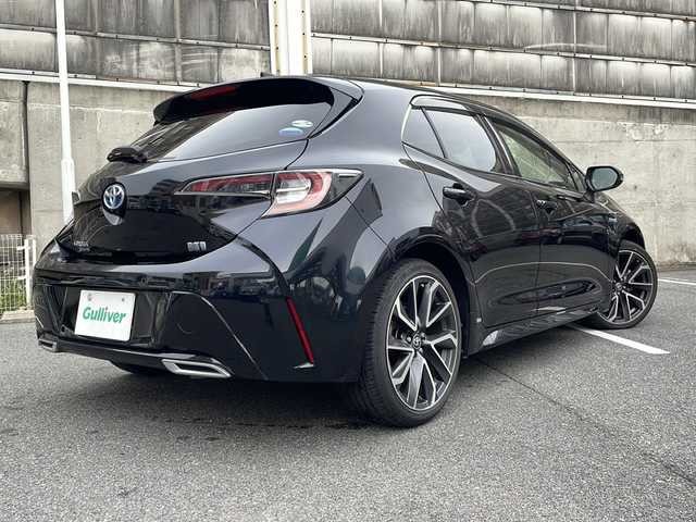 トヨタ カローラ スポーツ ハイブリッドG Z 愛知県 2018(平30)年 6.6万km アティチュードブラックマイカ ワンオーナー/純正ナビ/フルセグTV・Bluetooth・CD・DVD・SD・AM・FM/バックカメラ/Toyota Safety Sense/・レーダークルーズコントロール/・プリクラッシュセーフティー/・クリアランスソナー/・ブラインドスポットモニター/・レーントレーシングアシスト/・ロードサインアシスト/・先行車発進告知機能/・リヤクロストラフィックアラート/・パーキングサポートブレーキ/AC100V電源/オートブレーキホールド/オートハイビーム/LEDヘッドライト/フォグランプ/ヘッドライトレベライザー/ビルドインETC/純正18インチAW/ステアリングスイッチ/純正フロアマット/純正ドアバイザー/ISOFIX/ディーラー整備記録簿（H30.R1.R2.R3.R4.R5）/保証書/取扱説明書