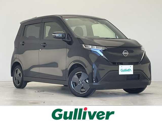 日産 サクラ X 愛知県 2024(令6)年 0.2万km ブラック エマージェンシーブレーキ/純正9型ディズプレイオーディオ　ナビ機能なし/バックカメラ/コーナーセンサー/純正アルミホイール/LEDヘッドライト/オートライト/ETC/衝突軽減システム/Bluetooth/ステアリングスイッチ/スマートキー/プッシュスタート