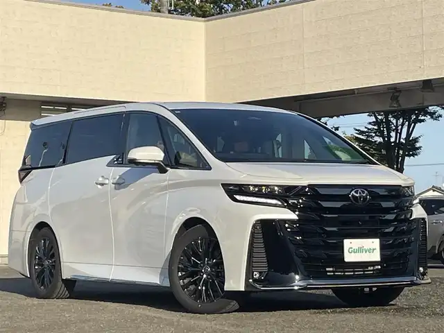 トヨタ ヴェルファイア ハイブリット Z プレミア 宮城県 2024(令6)年 0.8万km プラチナホワイトパールマイカ 純正ディーラーナビ/デジタルインナーミラー/ＥＴＣ２．０/ツインムーンルーフ/寒冷地仕様/レーダークルーズコントロール/プリクラッシュセーフティ/ブラインドスポットモニター/ヘッドアップディスプレイ/レーントレーシングアシスト/ロードサインアシスト/横滑り防止装置/ブレーキホールド/パノラミックビューモニター/バックガイドモニター/オートハイビーム/ハンドルヒーター/シートヒーター/パワーシート