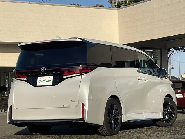 トヨタ ヴェルファイア ハイブリット Z プレミア 宮城県 2024(令6)年 0.8万km プラチナホワイトパールマイカ 純正ディーラーナビ/デジタルインナーミラー/ＥＴＣ２．０/ツインムーンルーフ/寒冷地仕様/レーダークルーズコントロール/プリクラッシュセーフティ/ブラインドスポットモニター/ヘッドアップディスプレイ/レーントレーシングアシスト/ロードサインアシスト/横滑り防止装置/ブレーキホールド/パノラミックビューモニター/バックガイドモニター/オートハイビーム/ハンドルヒーター/シートヒーター/パワーシート