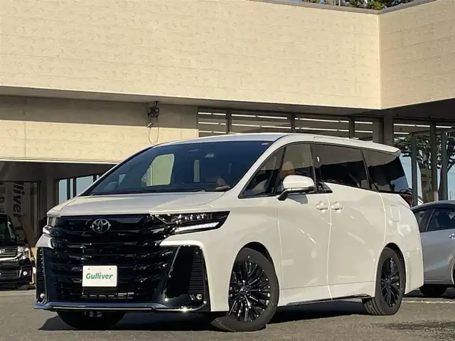 トヨタ ヴェルファイア ハイブリット Z プレミア 宮城県 2024(令6)年 0.8万km プラチナホワイトパールマイカ 純正ディーラーナビ/デジタルインナーミラー/ＥＴＣ２．０/ツインムーンルーフ/寒冷地仕様/レーダークルーズコントロール/プリクラッシュセーフティ/ブラインドスポットモニター/ヘッドアップディスプレイ/レーントレーシングアシスト/ロードサインアシスト/横滑り防止装置/ブレーキホールド/パノラミックビューモニター/バックガイドモニター/オートハイビーム/ハンドルヒーター/シートヒーター/パワーシート