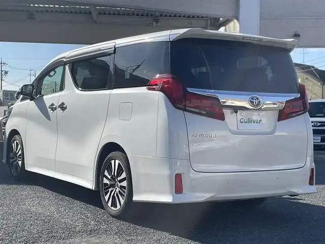 トヨタ アルファード S 兵庫県 2019(令1)年 7.3万km ホワイトパールクリスタルシャイン ・8人乗り/・SCパッケージ用18インチアルミホイール/・社外ナビ（TV/DVD/BT）/・ETC2.0/・デジタルインナーミラー（前後ドラレコ付き）/・バックカメラ/・フロントカメラ/・ステアリングスイッチ/・クルコン/・社外スピーカー/・ドアバイザー/・プッシュスタート/・電動パーキング/・純正フロアマット/・衝突軽減ブレーキ/・レーンアシスト/・１００V電源/・オートライト/・LEDヘッドライト