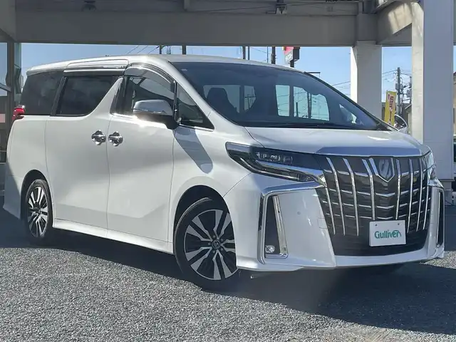 トヨタ アルファード S 兵庫県 2019(令1)年 7.3万km ホワイトパールクリスタルシャイン ・8人乗り/・SCパッケージ用18インチアルミホイール/・社外ナビ（TV/DVD/BT）/・ETC2.0/・デジタルインナーミラー（前後ドラレコ付き）/・バックカメラ/・フロントカメラ/・ステアリングスイッチ/・クルコン/・社外スピーカー/・ドアバイザー/・プッシュスタート/・電動パーキング/・純正フロアマット/・衝突軽減ブレーキ/・レーンアシスト/・１００V電源/・オートライト/・LEDヘッドライト