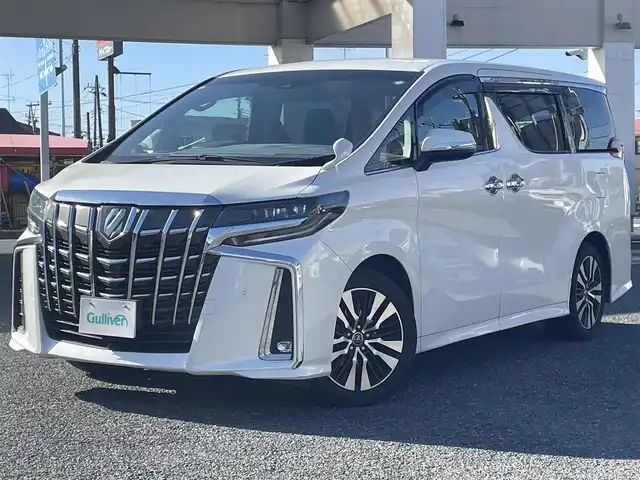 トヨタ アルファード S 兵庫県 2019(令1)年 7.3万km ホワイトパールクリスタルシャイン ・8人乗り/・SCパッケージ用18インチアルミホイール/・社外ナビ（TV/DVD/BT）/・ETC2.0/・デジタルインナーミラー（前後ドラレコ付き）/・バックカメラ/・フロントカメラ/・ステアリングスイッチ/・クルコン/・社外スピーカー/・ドアバイザー/・プッシュスタート/・電動パーキング/・純正フロアマット/・衝突軽減ブレーキ/・レーンアシスト/・１００V電源/・オートライト/・LEDヘッドライト