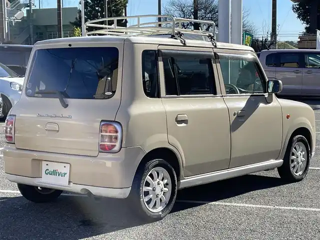 スズキ ラパン L 千葉県 2006(平18)年 9.8万km ミルクティーベージュメタリック 純正オーディオ/オートライト/シートカバー/ルーフキャリア/フロアマット