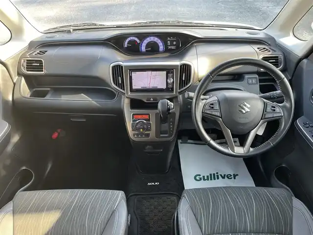 スズキ ソリオ バンディット Fリミテッド 千葉県 2016(平28)年 2.1万km ピュアホワイトP デュアルカメラブレーキサポート/社外SDナビ【AVIC-RW300】/バックカメラ/両後パワースライドドア/クルーズコントロール/スマートキー/ハーフレザーシート/前席シートヒーター/純正LEDヘッドライト/フォグランプ/純正15インチアルミホイール/ETC/本革巻きステアリング/アイドリングストップ/サイドエアバッグ/新車時保証書＆取扱説明書