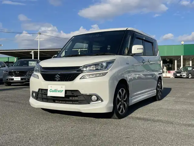 スズキ ソリオ バンディット Fリミテッド 千葉県 2016(平28)年 2.1万km ピュアホワイトP デュアルカメラブレーキサポート/社外SDナビ【AVIC-RW300】/バックカメラ/両後パワースライドドア/クルーズコントロール/スマートキー/ハーフレザーシート/前席シートヒーター/純正LEDヘッドライト/フォグランプ/純正15インチアルミホイール/ETC/本革巻きステアリング/アイドリングストップ/サイドエアバッグ/新車時保証書＆取扱説明書