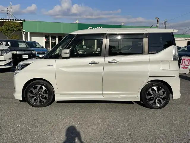 スズキ ソリオ バンディット Fリミテッド 千葉県 2016(平28)年 2.1万km ピュアホワイトP デュアルカメラブレーキサポート/社外SDナビ【AVIC-RW300】/バックカメラ/両後パワースライドドア/クルーズコントロール/スマートキー/ハーフレザーシート/前席シートヒーター/純正LEDヘッドライト/フォグランプ/純正15インチアルミホイール/ETC/本革巻きステアリング/アイドリングストップ/サイドエアバッグ/新車時保証書＆取扱説明書