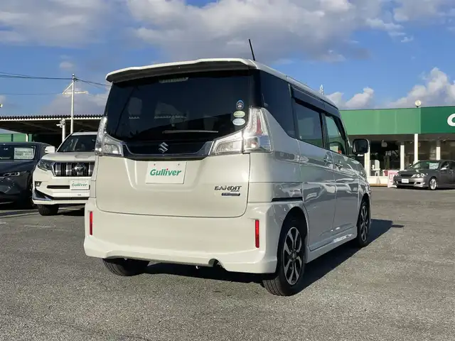 スズキ ソリオ バンディット Fリミテッド 千葉県 2016(平28)年 2.1万km ピュアホワイトP デュアルカメラブレーキサポート/社外SDナビ【AVIC-RW300】/バックカメラ/両後パワースライドドア/クルーズコントロール/スマートキー/ハーフレザーシート/前席シートヒーター/純正LEDヘッドライト/フォグランプ/純正15インチアルミホイール/ETC/本革巻きステアリング/アイドリングストップ/サイドエアバッグ/新車時保証書＆取扱説明書