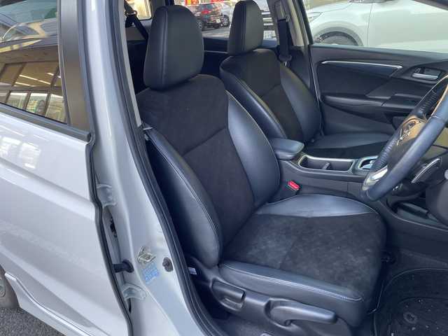 ホンダ シャトル ハイブリッド X ホンダセンシング 茨城県 2019(平31)年 7.5万km プラチナホワイトパール ワンオーナー/衝突軽減ブレーキ/純正SDナビ/FM/AM/CD/DVD/iPod/SD/USB/AUX/AppleCarPlay/Bluetooth接続/フルセグTV/ハーフレザーシート/シートヒーター（D＋N席）/レーダークルーズコントロール/バックカメラ/レーンキープアシスト/横滑り防止装置/アイドリングストップ/パドルシフト/ビルトインETC/LEDヘッドライト/保証書/取扱説明書