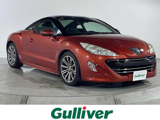 プジョー ＲＣＺ 福岡県 2011(平23)年 5.8万km ルージュトルマリン ・リモコンキー/・純正ナビ/・18インチ純正ホイール/・合皮シート/・Bluetooth/・キセノンヘッドライト/・コーナーセンサー/・シートヒーター/・Bカメラ/・iPod/・電動リアゲート