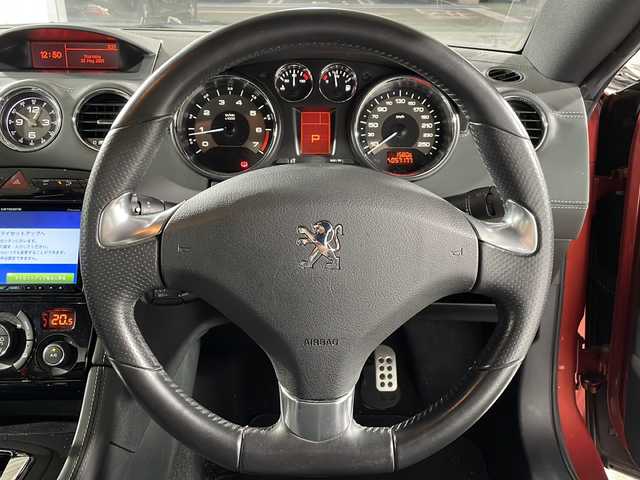 プジョー ＲＣＺ 福岡県 2011(平23)年 5.8万km ルージュトルマリン ・リモコンキー/・純正ナビ/・18インチ純正ホイール/・合皮シート/・Bluetooth/・キセノンヘッドライト/・コーナーセンサー/・シートヒーター/・Bカメラ/・iPod/・電動リアゲート