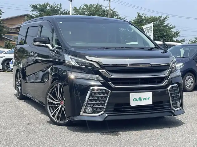 トヨタ ヴェルファイア Z Gエディション 群馬県 2017(平29)年 3.8万km ブラック ワンオーナー/社外メモリナビ、地デジ、Bluetooth、CD、DVD/　（EX11Z）/バックカメラ/社外フリップダウンモニター/クルーズコントロール/クリアランスソナー（リア）/社外２１インチアルミ/TEIN車高調/助手席、２列目オットマン/前席パワーシート/ウインカーミラー/ステアリングヒーター/パワーバックドア/ビルトインETC/LEDヘッドライト/ウッドコンビステア/スマートキー/保証書、取説