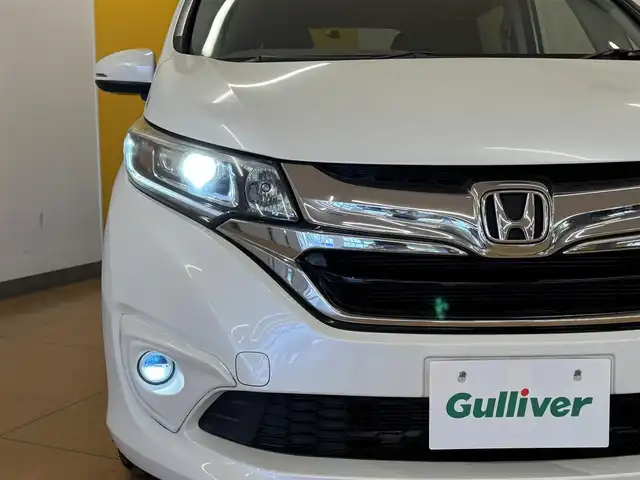 ホンダ フリード ハイブリット G ホンダセンシング 群馬県 2016(平28)年 8.3万km ホワイトオーキッドパール ホンダセンシング/純正9インチSDナビ/　　CD/DVD/BT/フルセグ/MSV/　　USB/iPod/AUX/HDMI/バックカメラ/両側パワースライドドア/レーダークルーズコントロール/LEDオートライト/前後ドライブレコーダー/レーンアシスト/横滑り防止装置/スマートキー/ビルトインETC