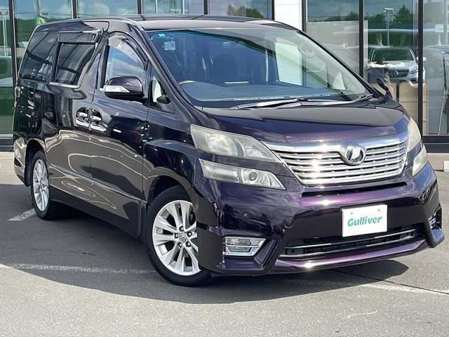 トヨタ ヴェルファイア 2．4Z 宮城県 2011(平23)年 15.6万km ボルドーマイカメタリック ・4WD/・社外SDナビ/(CD/DVD.BT.USB.SD.iPod)/・バックカメラ/・純正フリップダウンモニター/(V9T-R59C)/・両側パワースライドドア/・社外エンジンスターター/・ETC/・寒冷地仕様/・フロントワイパーデアイサー/・MTモード付AT/・コーナーセンサー/・横滑り防止/・HIDヘッドライト/・フォグライト/・オートライト/・カーテンエアーバック