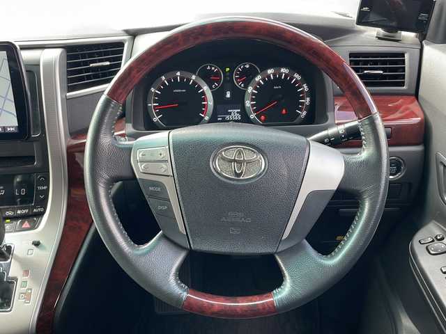 トヨタ ヴェルファイア 2．4Z 宮城県 2011(平23)年 15.6万km ボルドーマイカメタリック ・4WD/・社外SDナビ/(CD/DVD.BT.USB.SD.iPod)/・バックカメラ/・純正フリップダウンモニター/(V9T-R59C)/・両側パワースライドドア/・社外エンジンスターター/・ETC/・寒冷地仕様/・フロントワイパーデアイサー/・MTモード付AT/・コーナーセンサー/・横滑り防止/・HIDヘッドライト/・フォグライト/・オートライト/・カーテンエアーバック