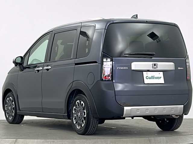 ホンダ フリード ハイブリット e:HEV クロスター 大阪府 2025(令7)年 0.1千km メテオロイドグレーメタリック 登録済未使用車/純正9インチSDナビ/【BT/フルセグTV/USB/AppleCarPlay/AndroidAuto]/バックカメラ/パワースライドドア　左/衝突被害軽減システム/ブラインドスポットモニター/コーナーセンサー前後/クルーズコントロール追従/オートライト/ハーフレザーシート　/シートヒータ　D+N席/スペアキー