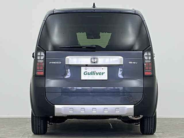 ホンダ フリード ハイブリット e:HEV クロスター 大阪府 2025(令7)年 0.1千km メテオロイドグレーメタリック 登録済未使用車/純正9インチSDナビ/【BT/フルセグTV/USB/AppleCarPlay/AndroidAuto]/バックカメラ/パワースライドドア　左/衝突被害軽減システム/ブラインドスポットモニター/コーナーセンサー前後/クルーズコントロール追従/オートライト/ハーフレザーシート　/シートヒータ　D+N席/スペアキー