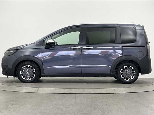 ホンダ フリード ハイブリット e:HEV クロスター 大阪府 2025(令7)年 0.1千km メテオロイドグレーメタリック 登録済未使用車/純正9インチSDナビ/【BT/フルセグTV/USB/AppleCarPlay/AndroidAuto]/バックカメラ/パワースライドドア　左/衝突被害軽減システム/ブラインドスポットモニター/コーナーセンサー前後/クルーズコントロール追従/オートライト/ハーフレザーシート　/シートヒータ　D+N席/スペアキー