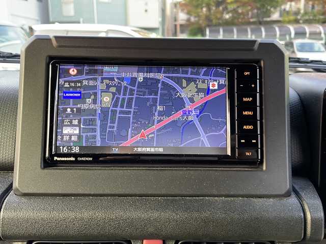 スズキ ジムニー XC 大阪府 2023(令5)年 0.7万km ミディアムグレー ワンオーナー/社外SDナビ/BTオーディオ/フルセグテレビ/CD/DVD/LEDヘッドライト/オートライト/フォグランプ/TERZO製ルーフキャリア/ETC/ドライブレコーダー/純正16インチAW/純正フロアマット/スペアキー