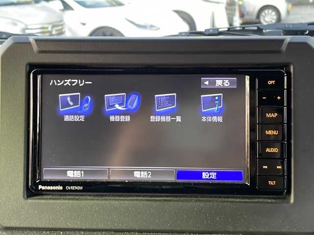 スズキ ジムニー XC 新潟県 2023(令5)年 0.7万km ミディアムグレー ワンオーナー/MT車/衝突軽減ブレーキ/レーンキープアシスト/アイドリングストップ/社外SDナビ（Panasonic CN-RZ743W)/(CD/DVD/フルセグTV/Bluetooth）/ETC/スマートキー×2/革巻きステアリング/クルーズコントロール/ステアリングリモコン/シートヒーター/LEDヘッドライト/オートライト/オートエアコン/フォグランプ/TERZO製ルーフキャリア/純正16インチAW/純正フロアマット/ドアバイザー/保証書/取扱説明書/ナビ取扱説明書